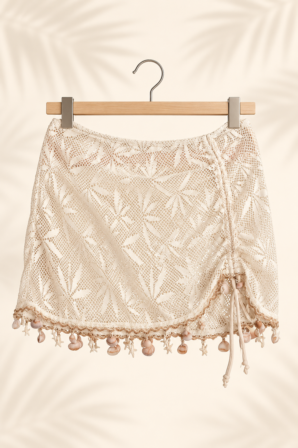 Falda de playa calada con conchitas · Talla L