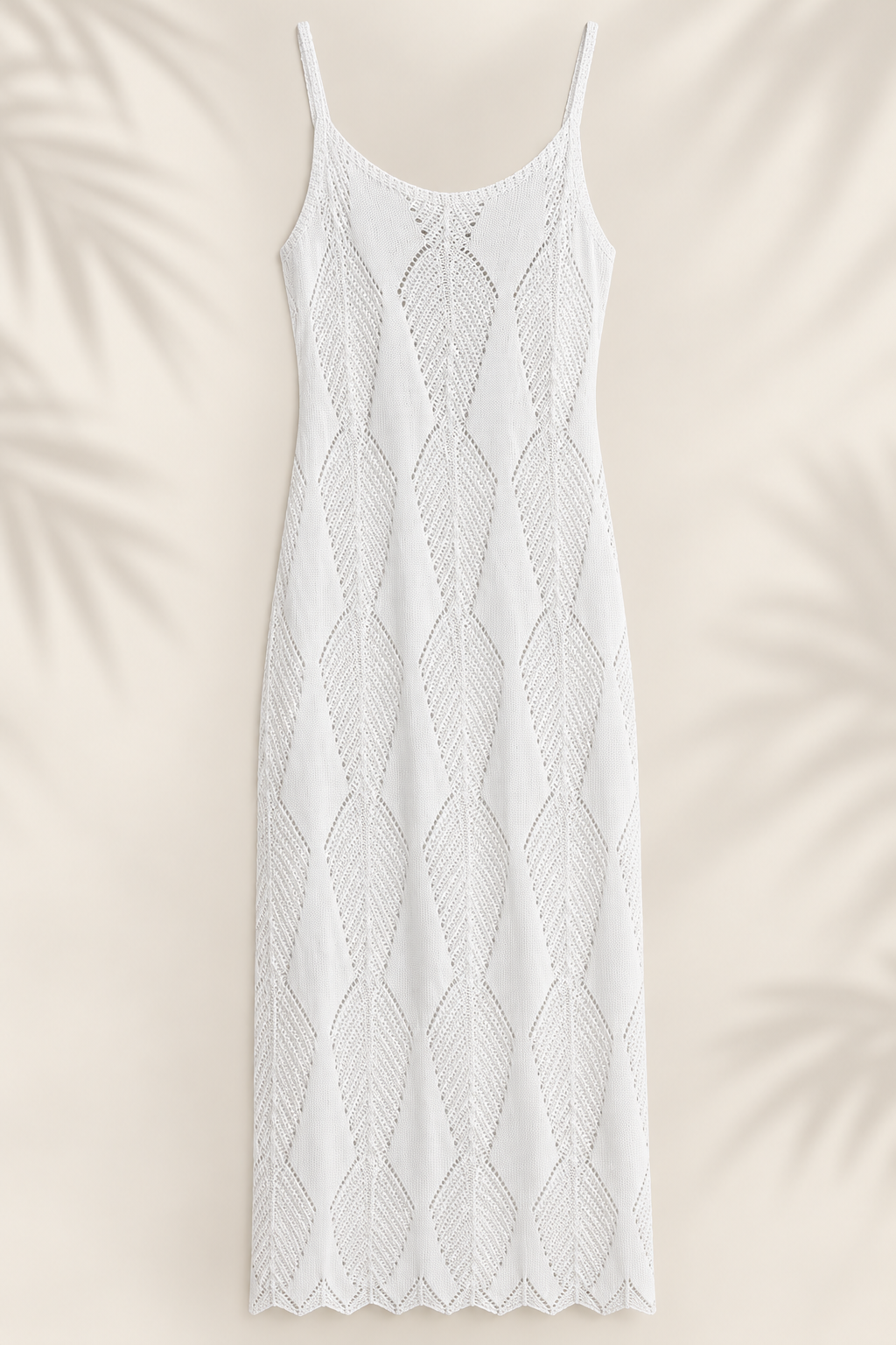Vestido de playa blanco tejido con diseño de hojas