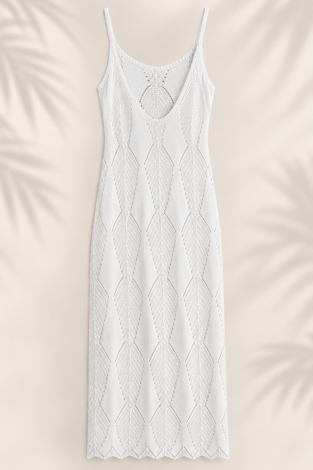Vestido de playa blanco tejido con diseño de hojas