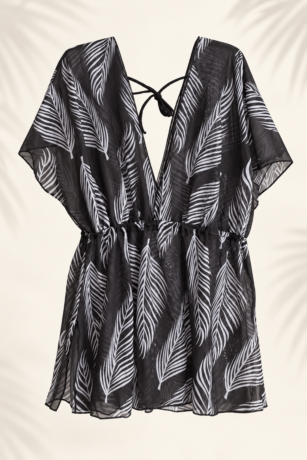 Vestido corto de playa negro con estampado de hojas