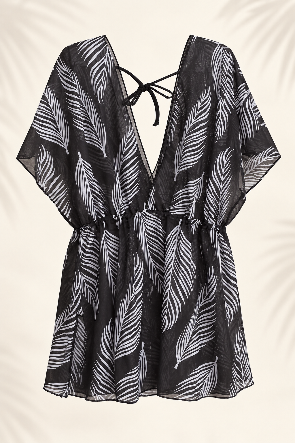 Vestido corto de playa negro con estampado de hojas