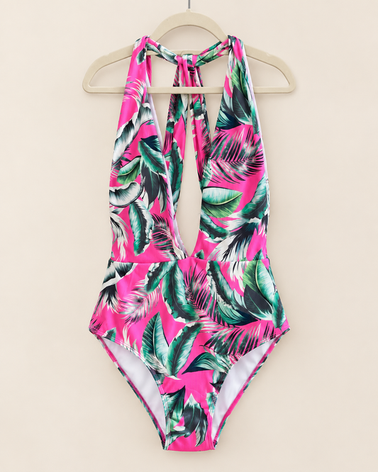Traje de baño tropical fucsia texturizado con escote pronunciado