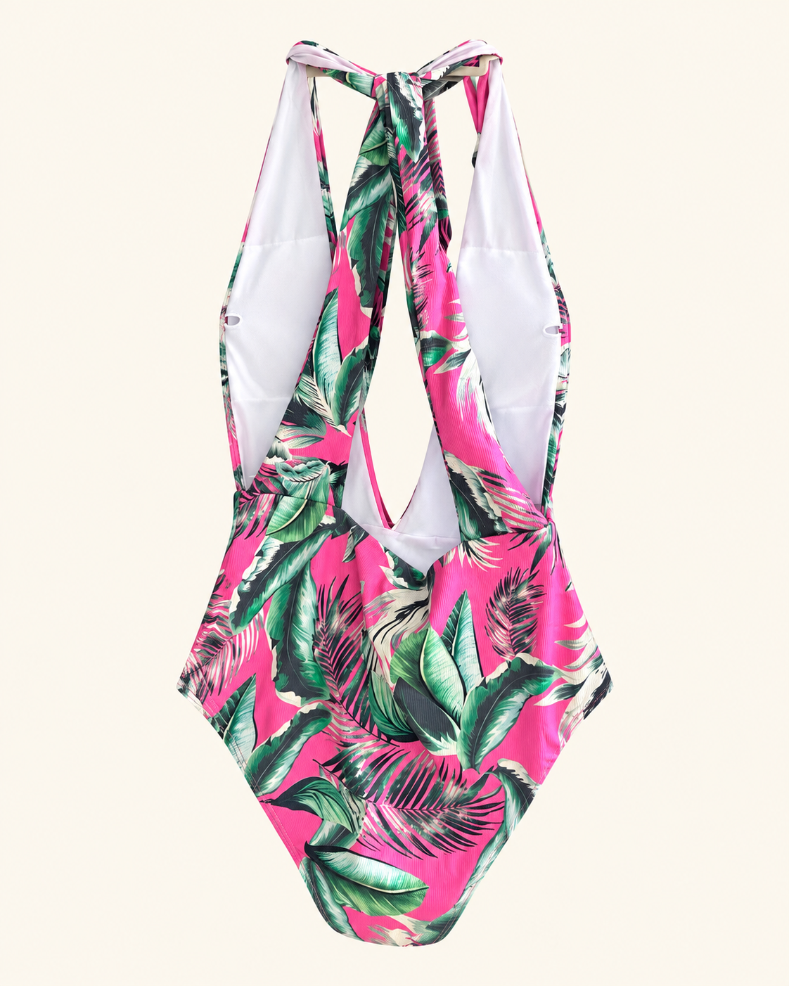 Traje de baño tropical fucsia texturizado con espalda abierta